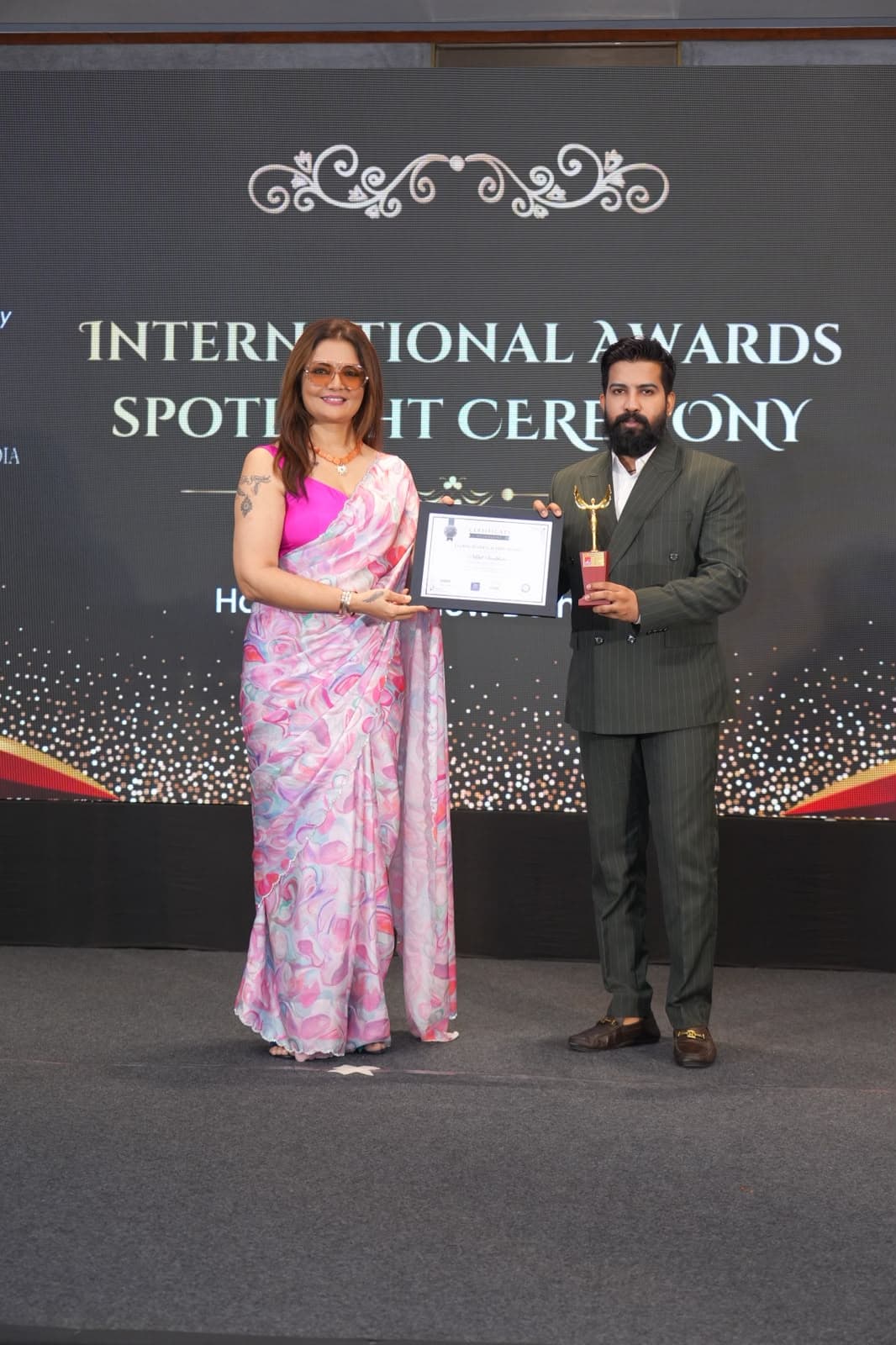 Growthora receiving the Global Business Leader Award 2026